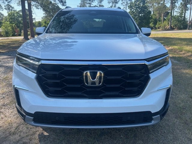 2024 Honda Pilot Touring in Other — front three-quarter view